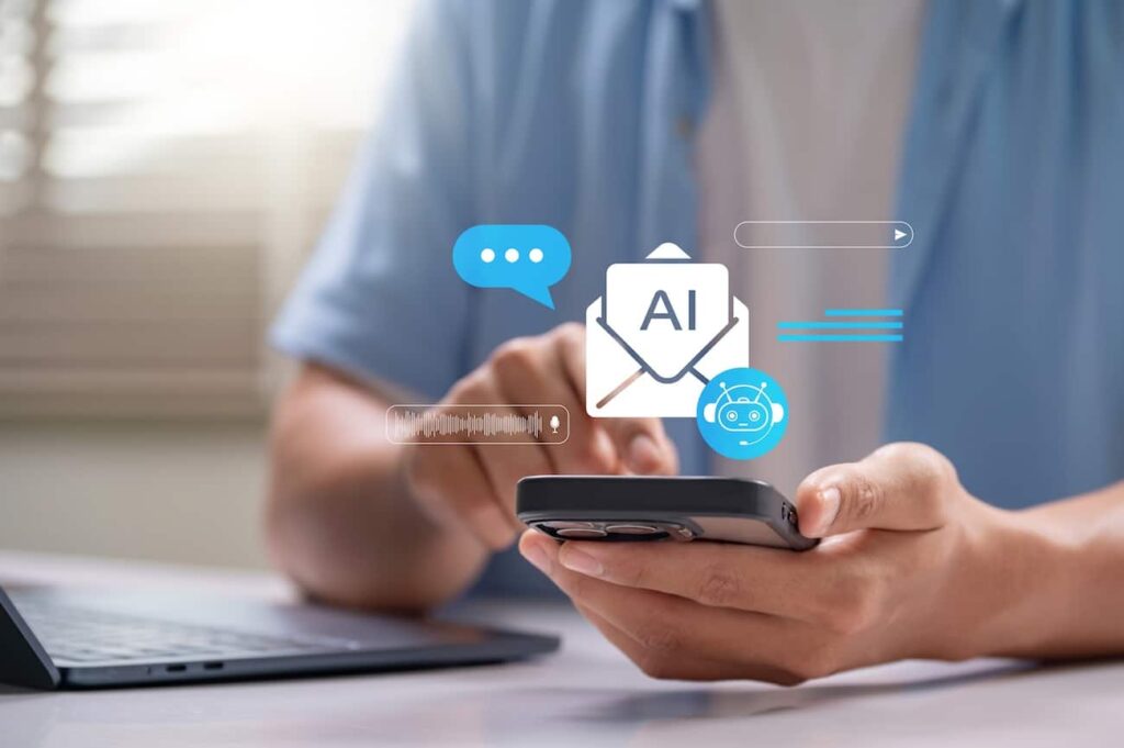 Person holding mobile phone while checking email, and AI having access to email