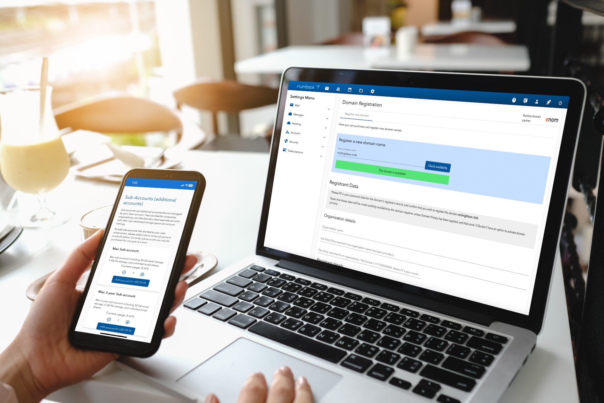 Domain hosting with your own domain laptop and phone showing Runbox domain registration and subscription interfaces