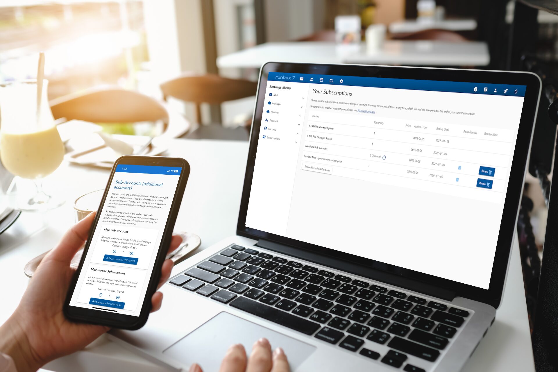 Email hosting with your own omain - laptop and phone showing Runbox subscription interfaces Email hosting with your own omain laptop and phone showing Runbox subscription interfaces